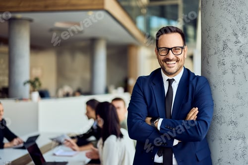 Preview: Confident Businessman Smiling in a Modern Office Setting, Leading a Professional Team