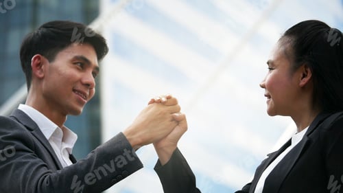 Preview: Two business man and woman happy to finished goal successful