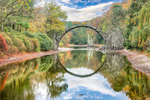 Preview: Astonishing autumn landscape in Azalea and Rhododendron Park Kromlau. Rakotz Bridge
