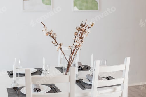 Preview: Eco friendly home decor cotton branch in vase on table.Modern minimalistic scandinavian interior