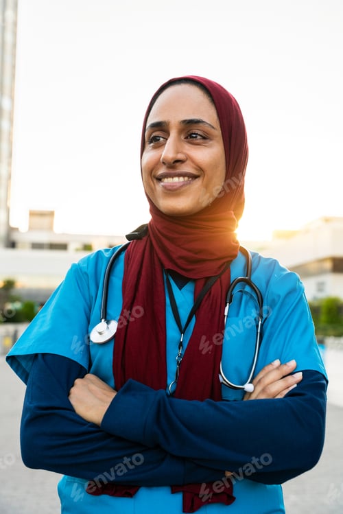 Preview: Beautiful arab nurse wearing hijab portrait in the city