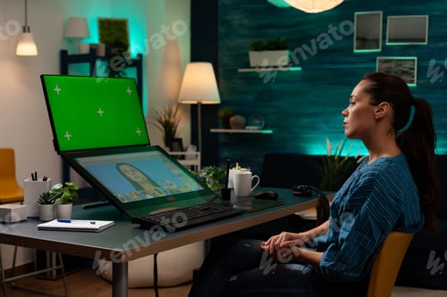 Preview: Professional photographer working with green screen and editing