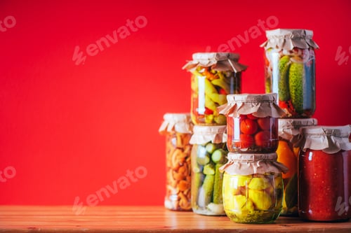 Preview: Preserved and fermented food in glass jars. Fermented food. Autumn canning. ?ucumber, squash and
