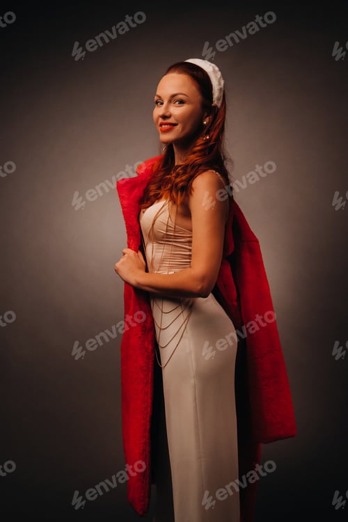 Preview: a woman in a white dress and a red fur coat with a white Hoop on a black isolated background
