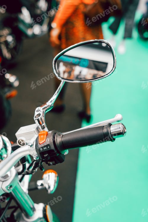 Preview: Detail of the handlebar and mirror of a custom motorbike