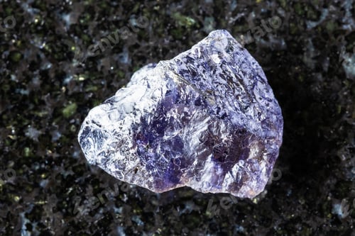 Preview: sample of unpolished cordierite mineral on black