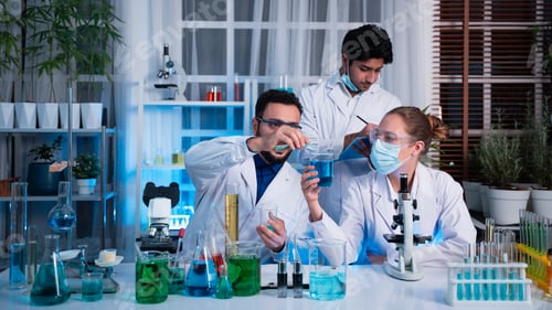 Preview: A group of young scientists are conducting experiments in the lab using a microscope.