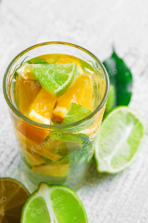 Preview: homemade lemonade with lime and mint. creative photo.