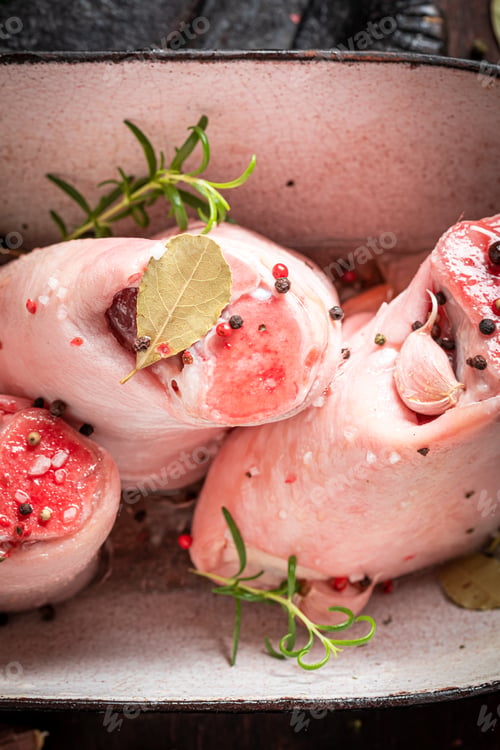 Preview: Preparation for roasted pork knuckle seasoned with spices and salt.