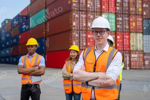 Preview: Group of engineer worker and manager standing in the shipping yard container.