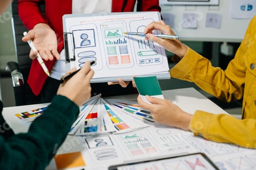 Preview: UX developer and ui designer brainstorming about mobile app interface wireframe design