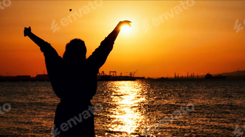 Preview: Young Woman Silhouette in Sunset