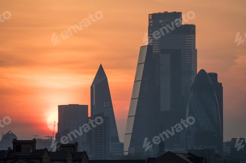 Preview: Sunset silhouettes against the city skyline