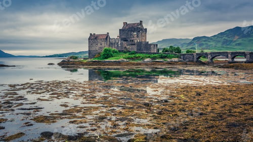 Preview: Stunning dusk over loch at Eilean Donan Castle, Scotland