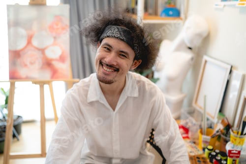 Preview: young asian male person painting artist working in studio, art hobby lifestyle at home