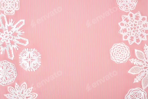 Preview: christmas background with paper snowflakes on pink