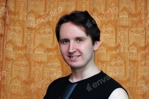 Preview: Portrait Of Young Funny Man In The Room