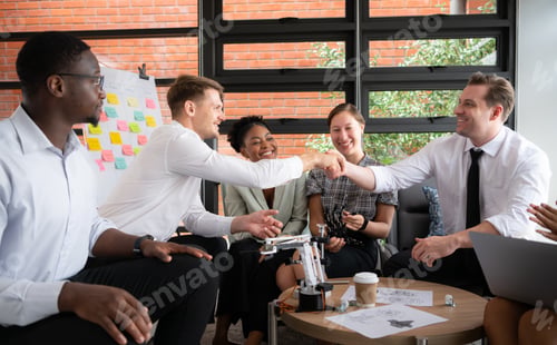 Preview: Group of diverse business people working together in the office,