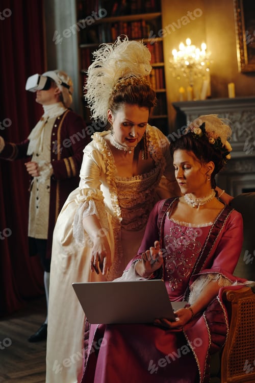 Preview: Two Caucasian Middle Aged Women Using Laptop in Baroque Renaissance Setting