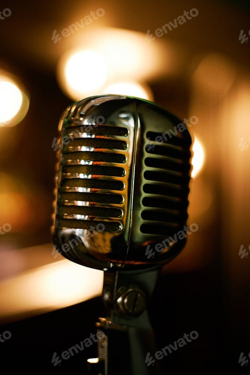 Preview: Retro Microphone Standing against Blurred Lights in Jazz Club