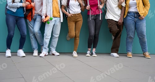 Preview: Multiracial group of unrecognizable erasmus students enjoying free time. Generation z, relationships