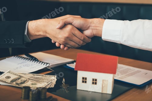 Preview: Home sales agents and buyers work on signing new homes and shaking hands.