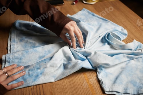Preview: Creating unique tie dye designs in a modern craft space with a young talented woman