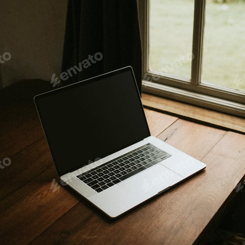 Preview: Digital laptop on a wooden table