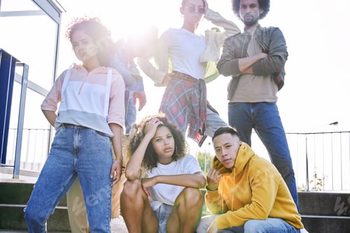 Preview: Portrait of serious young group of friends outdoors