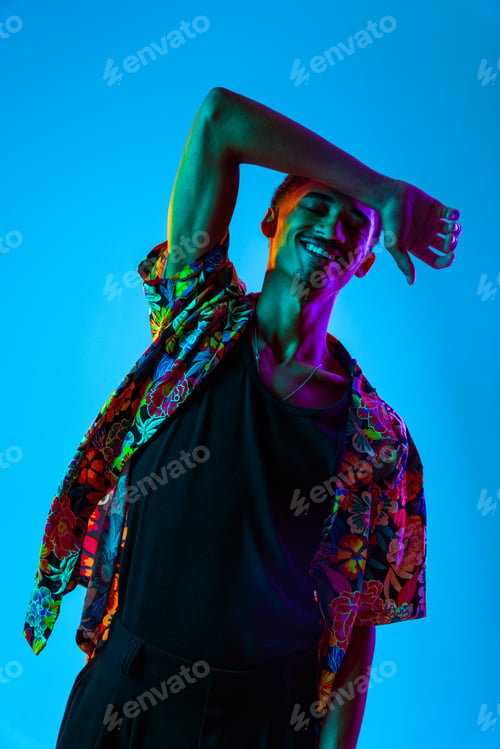 Preview: African man portrait in studio on colorful background