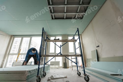 Preview: Construction worker installation ceiling work
