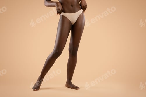 Preview: Long slim legs of unrecognizable african american woman