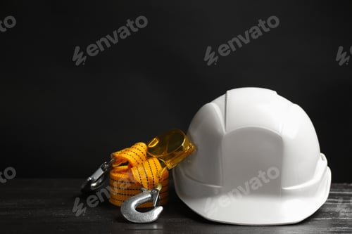 Preview: Composition with safety equipment on table. Space for text