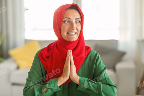Preview: Woman Wearing Red and Green Hijab, Praying