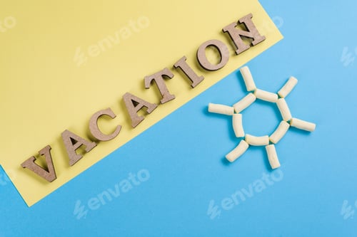 Preview: Abstract background image. Word vacation wooden letters on a blue and yellow background, and an