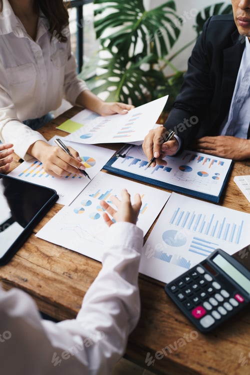 Preview: Business People Planning Strategy Analysis from financial document report, Office Concept