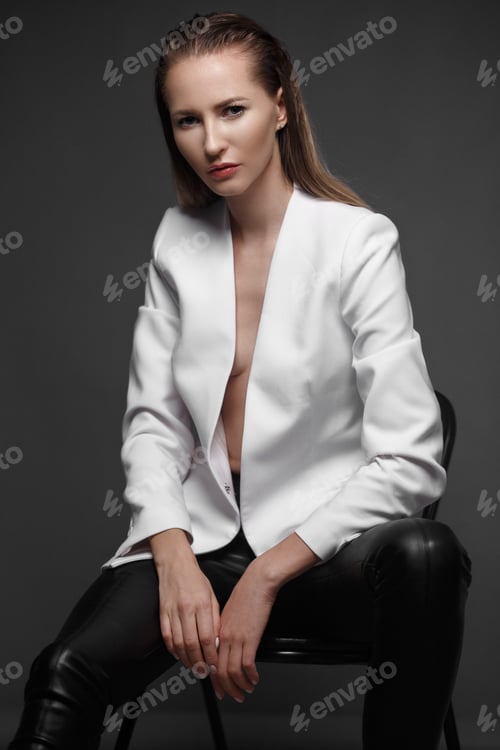 Preview: fashion model with long hair, European attractive, perfect skin is posing in studio for test photo