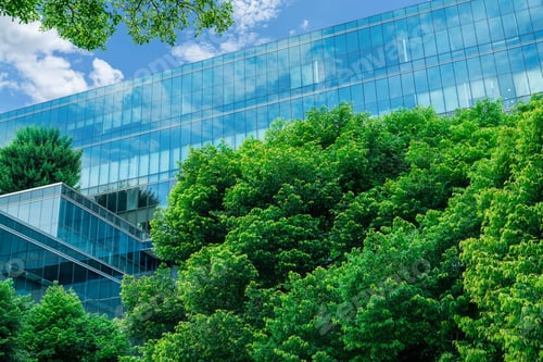 Preview: Eco-friendly building in modern city. Sustainable glass office building with trees for reducing CO2.