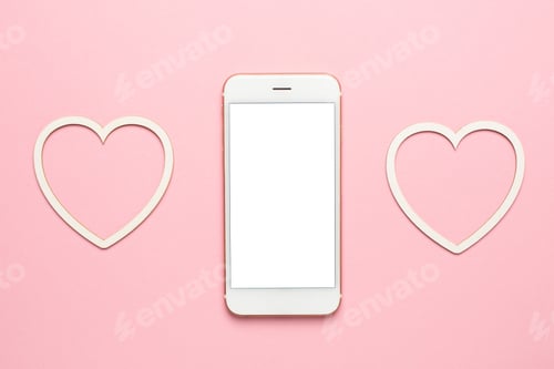 Preview: Modern mobile phone with hearts, social distancing and dating concept, valentines day