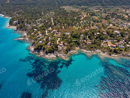 Preview: Aerial view of an island on Sithonia Peninsula, Greece, with beaches and rocks, surrounded by