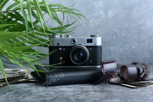 Preview: Vintage film camera and photo album