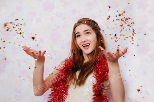 Preview: The Girl Or Teenager In A Brilliant Dress And Red Tinsel Having Fun, Smiling And Throwing Confetti