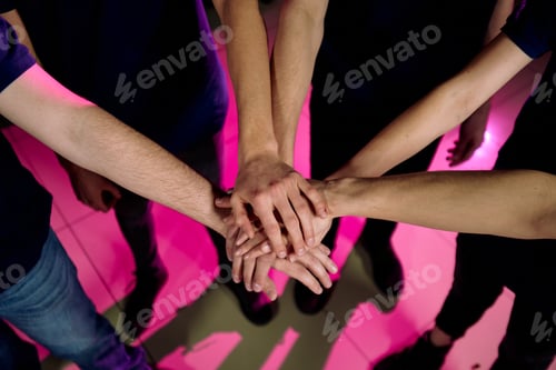 Preview: Stacking hands as symbol of teamwork