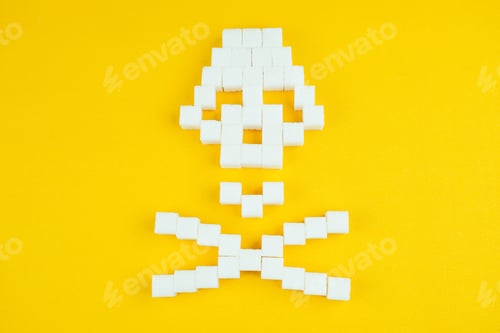 Preview: The bones skull made of sugar cubes on a yellow background. Sugar kills and diabetes concept