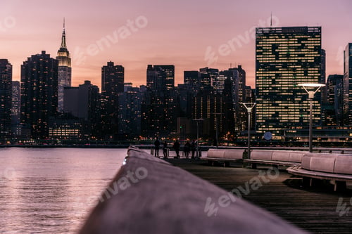 Preview: View of Manhattan skyline from Long Island City waterfront at dusk.
