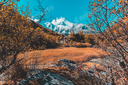 Preview: Pearl Lake or Zhuoma La Lake and snow mountain in autumn in Yading Nature reserve, Sichuan, China.