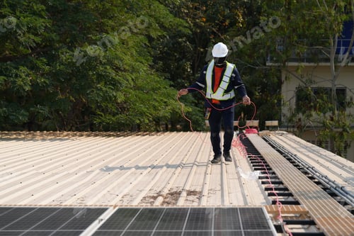 Preview: Renewable Energy Eco Technology Electric Power Industry Solar Panels on rooftop.