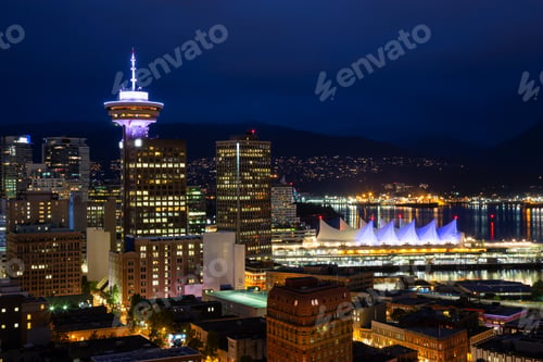 Preview: View of the modern cityscape from an aerial perspective at night