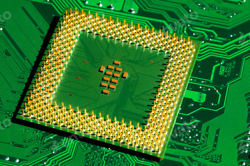 Preview: Close up of microchips and pins on Main CPU PC processor circuit board.