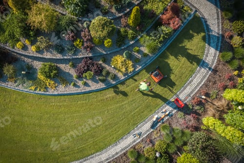 Preview: Aerial View of Landscaper Aerating Clients Lawn